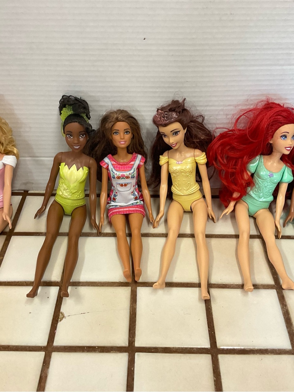 Barbie Dolls Lot with Yellow, Green, Red and Pink Outfits